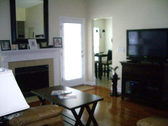 Great Room with hardwood floors and Fireplace