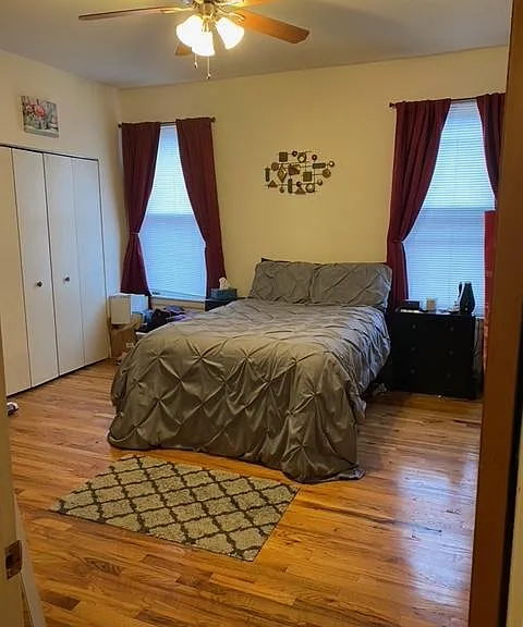 BEDROOM, CEILING FAN, STORM WINDOWS WITH SCREENS