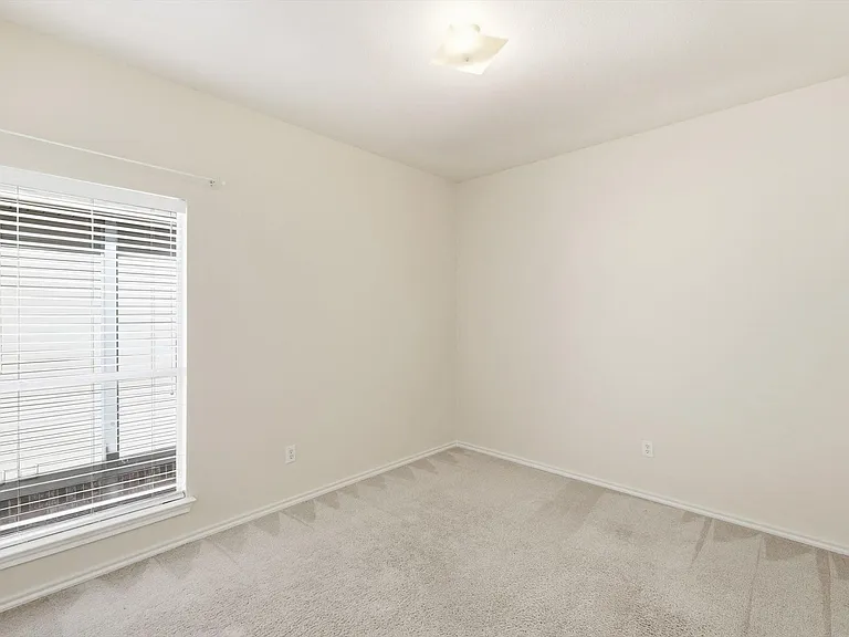 Bedroom 2 up with large window and lots of light