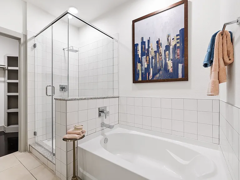 Model Bathroom with Soaking Garden Tub and Standing Shower