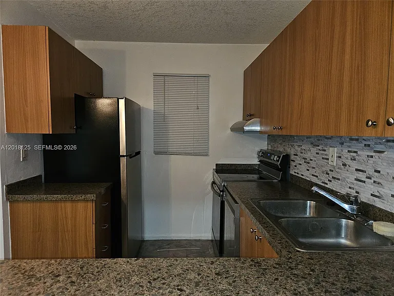 7610 Stirling Rd #102C — Photo 5