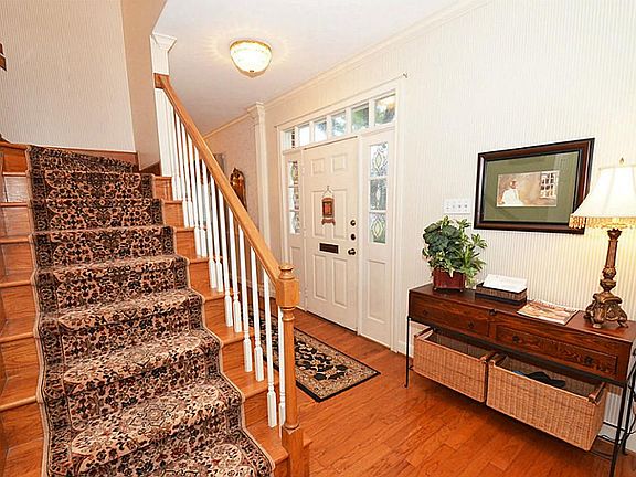The stairs are lined with custom carpets.