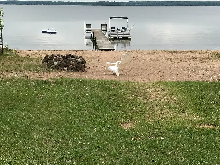 Another view of the beach and fire pit
