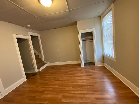 Living room with steps to 3rd floor bedroom
