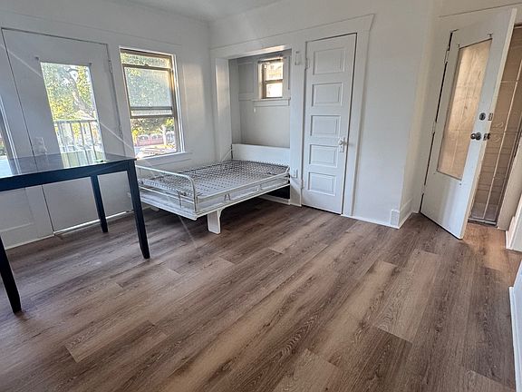 Living room with murphy bed pulled down