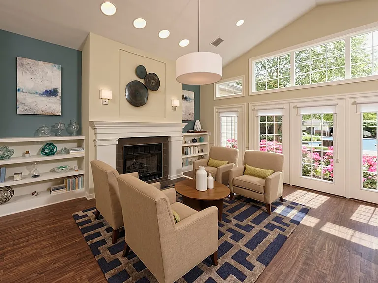Leasing office with fireplace and lounge seating