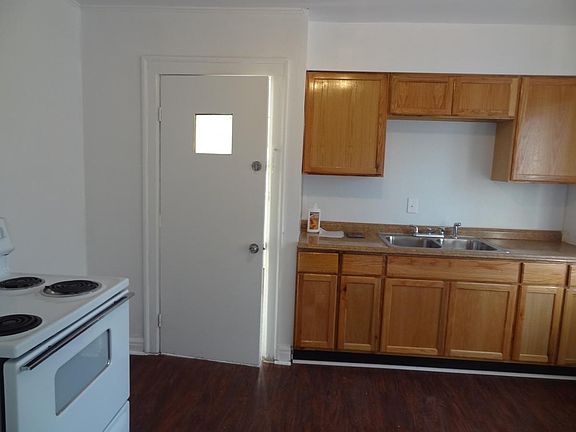 Brand new kitchen with brand new wood flooring