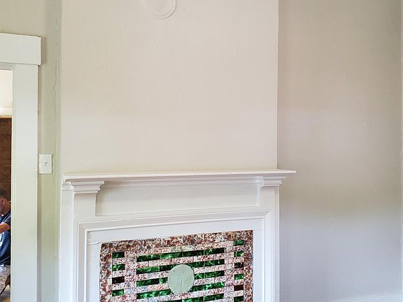 Beautiful, inoperable fireplace living area.