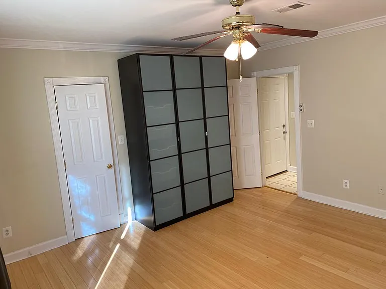 bedroom looking into entrance hallway