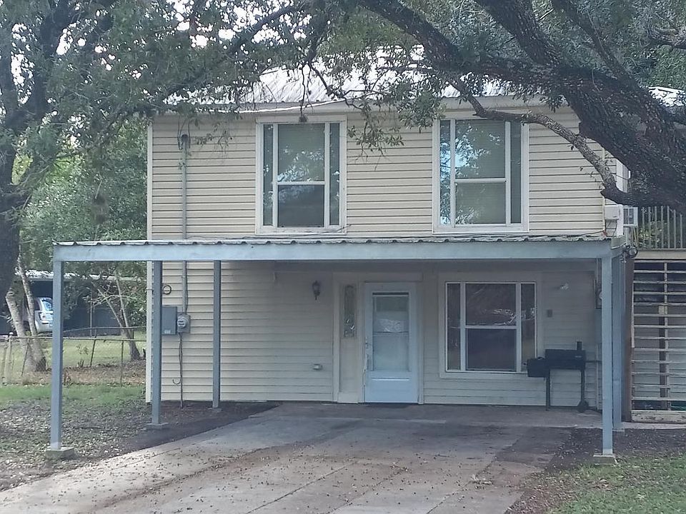 813 Raab Ave. Street view with 2 car shared carport