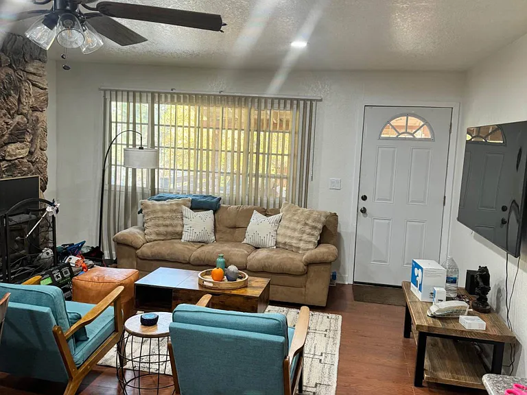 Living room with new 65" LG wall mounted smart TV