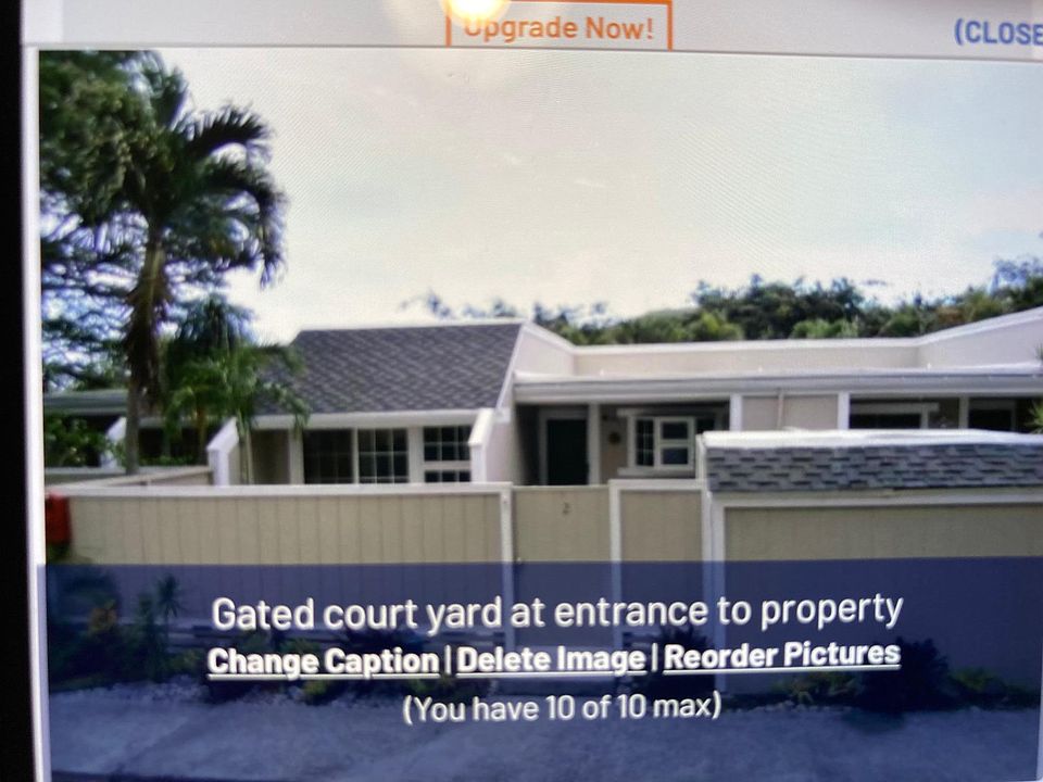 Gated courtyard at entrance to property