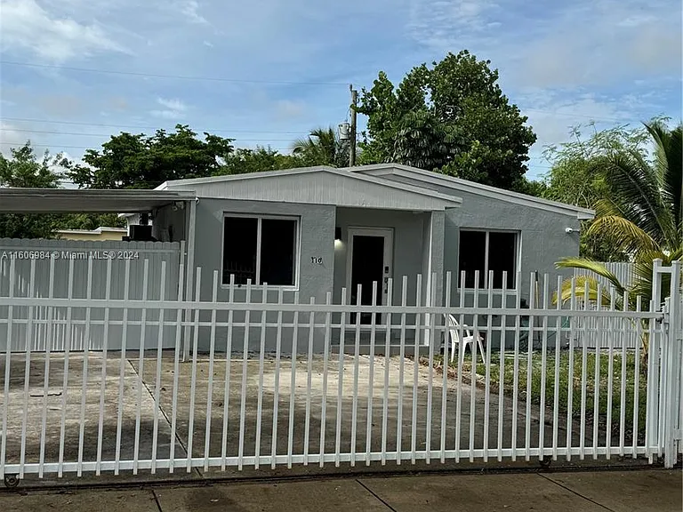 110 NW 120th Ter — Photo 1