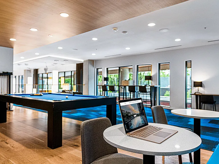 Apt CoWork Pool Table and Workspace at Sugarmont Apartments in Sugar House