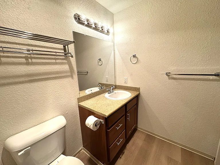 Bathroom with storage below the sink