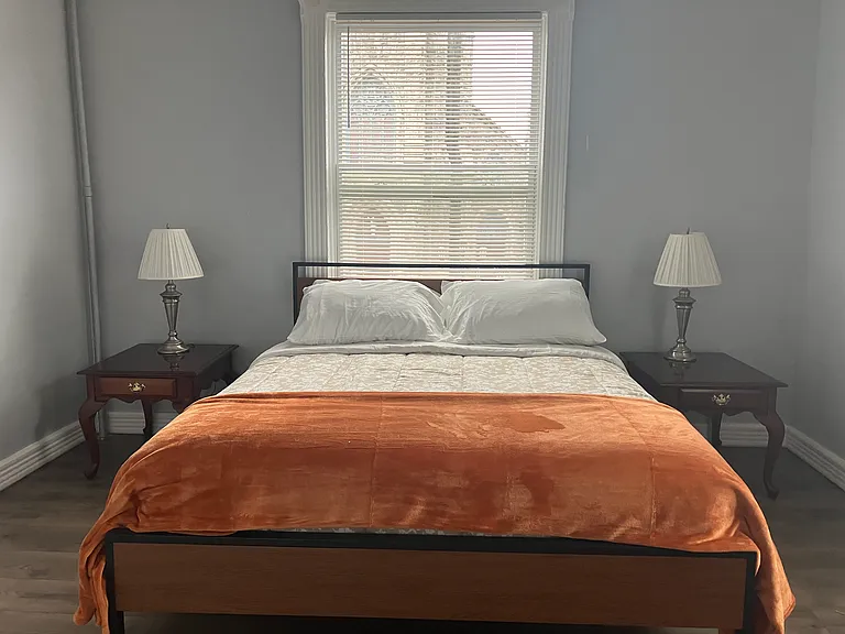 Bedroom 1 with new queen bed and extra blanket