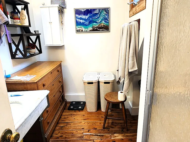 bathroom with shower stall