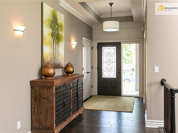 High ceilings with vaults in main entry and custom crafted decorative trim detail. Rocker light switches and lever door handles are all standard.