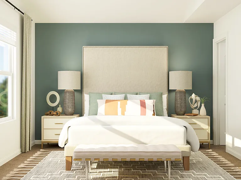 The master bedroom has a large window.