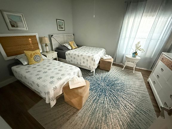 downstairs bedroom. Can fit either two twin beds or two full