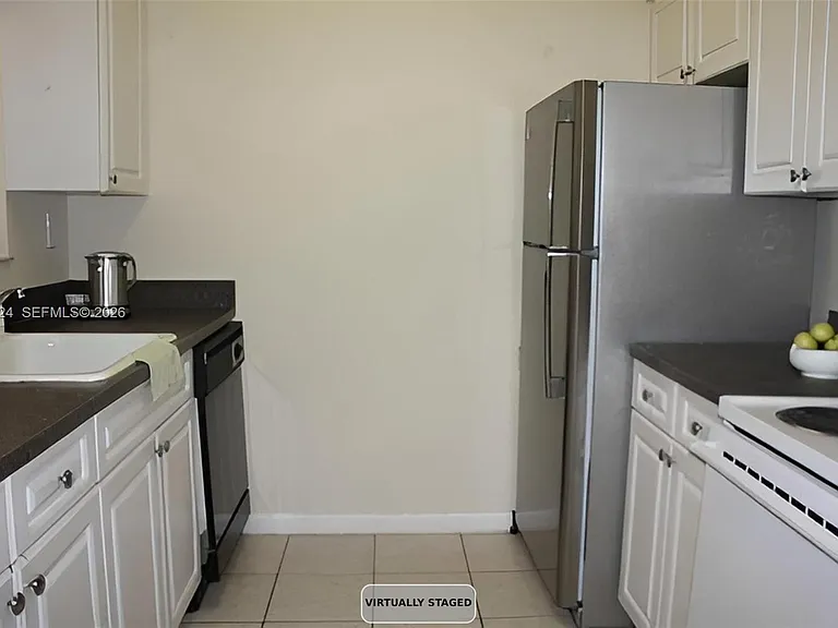 1701 NW 96th Ter #1J — Photo 4