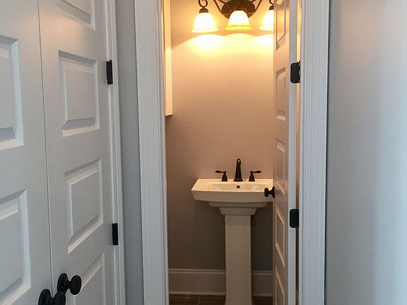 Half bathroom off back hall