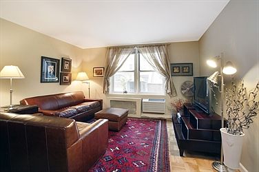 1st image of 101 W 23rd St APT 2F