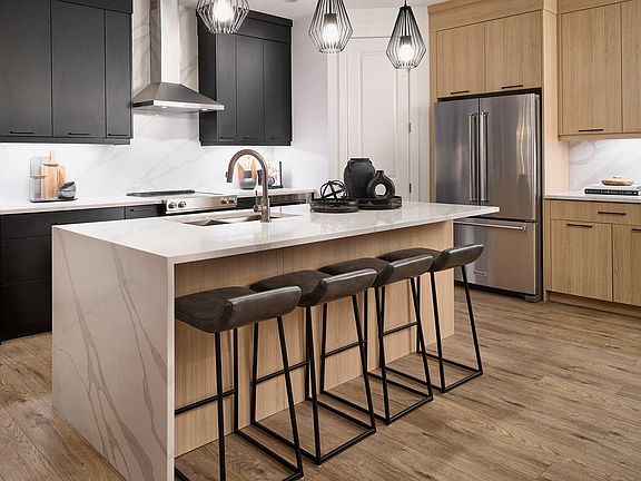 A photo of the kitchen of the Robson 24 model in Calgary by Brookfield Residential