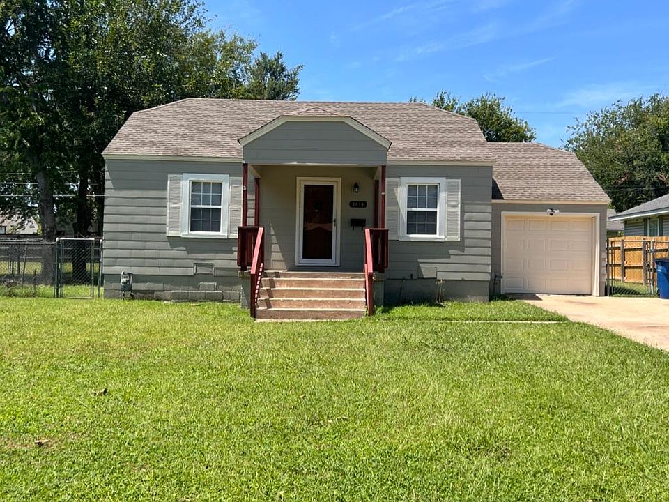 Front Elevation as viewed from street. New exterior paint and staining on handrails.