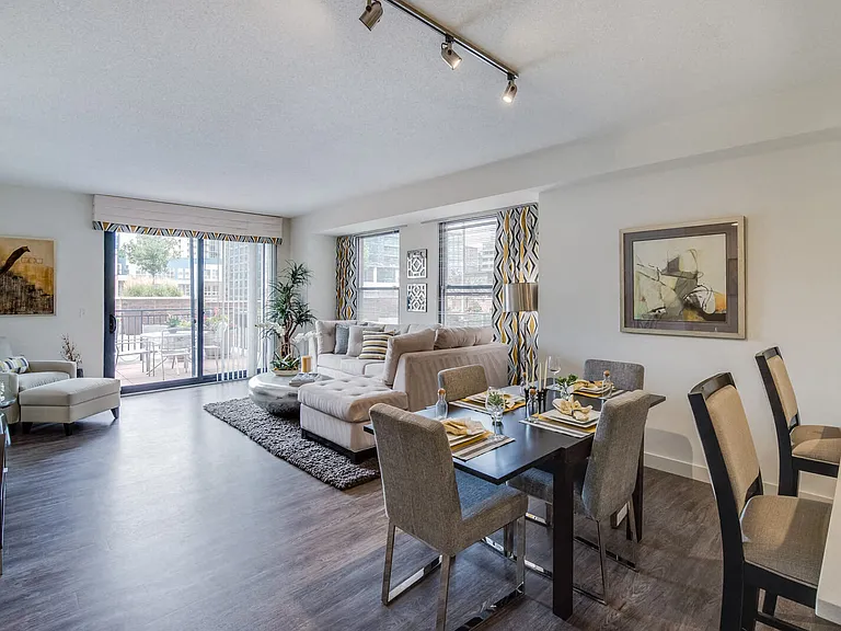 Brighten your living room with large windows that flood the space with natural light.