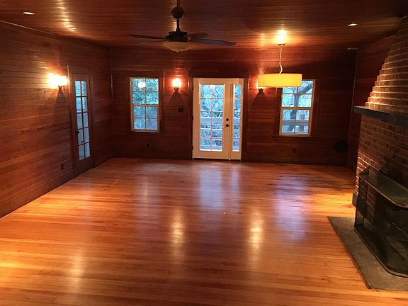 Huge all wood living room with fireplace 