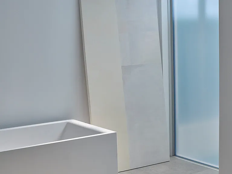 Serene Bathroom with Floor-to-Ceiling Glass _ Minimalist yet luxurious, this bathing sanctuary is designed with sleek marble finishes, a floating vanity, and an abundance of natural light to elevate your daily rituals.