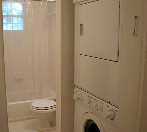 The bathromm has built-in stackable washer/dryer for convenience.