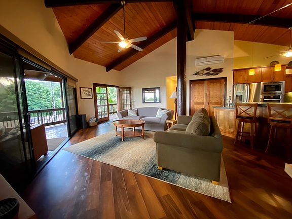 Great room with indoor/outdoor living and views of the ocean