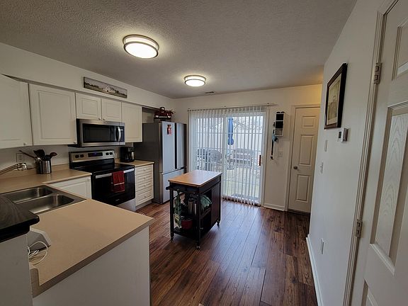 Kitchen - small island does not convey with property. Newer Appliances!