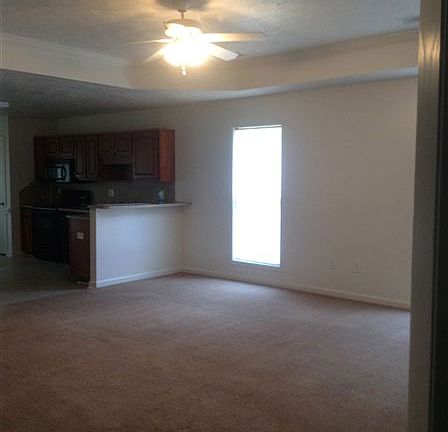 Living room is open to the Kitchen area. Kitchen has area fo