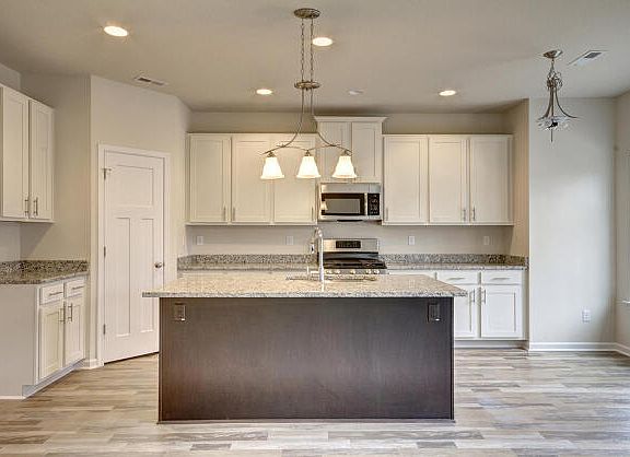 These photos are representative of this floor plan, but all options may not be available in every co