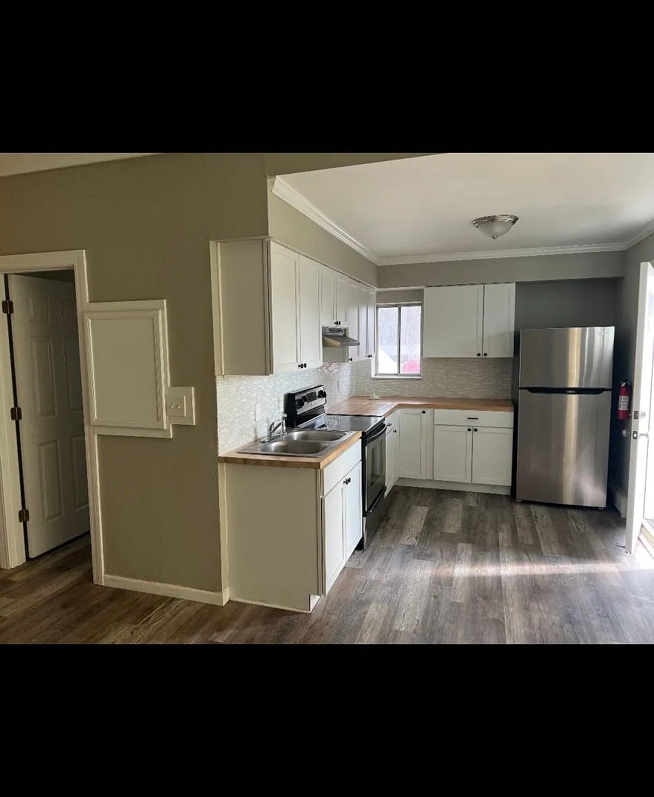 8251 Woodland Shore Dr — Photo 1