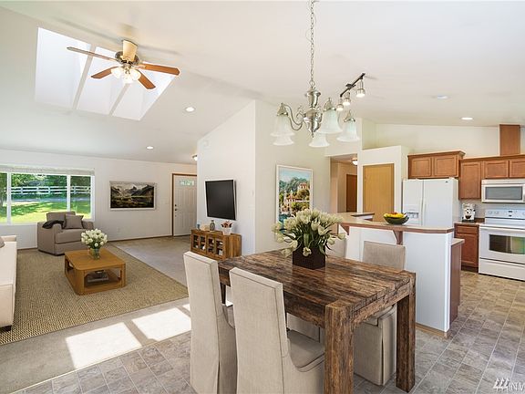 The great room makes for a perfect gathering place (virtually staged)