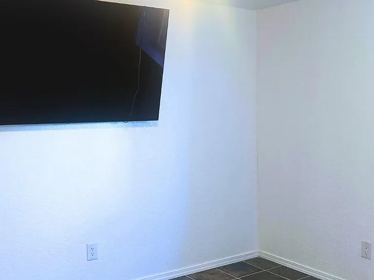 Downstairs bedroom (TV not included)