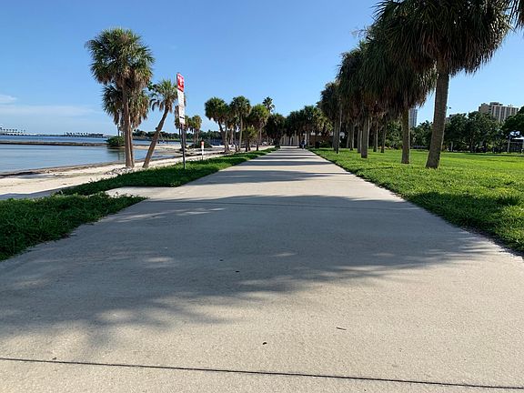 On North Shore Park with Olympic pools, free lighted tennis courts, and beach volleyballs