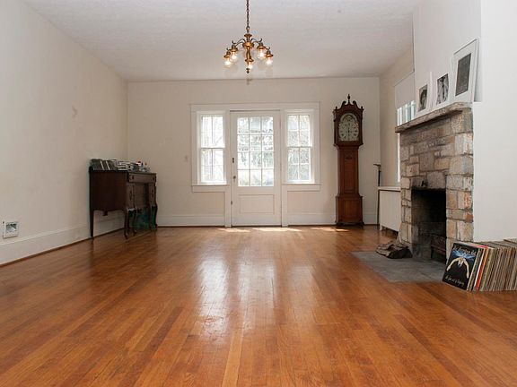 Living room, 16'x26' leads to both front & rear porches