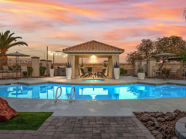 Experience Arizona Twilight where vibrant skies reflecting off crystal-clear waters. Unwind in style with high-top seating, shaded umbrellas, and the perfect evening ambiance