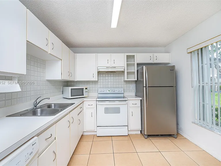 3877 NW 122nd Ter #1-L — Photo 20