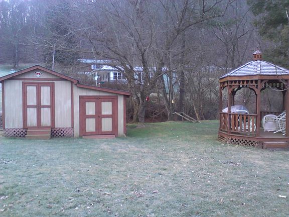 Outbuilding and gazebo