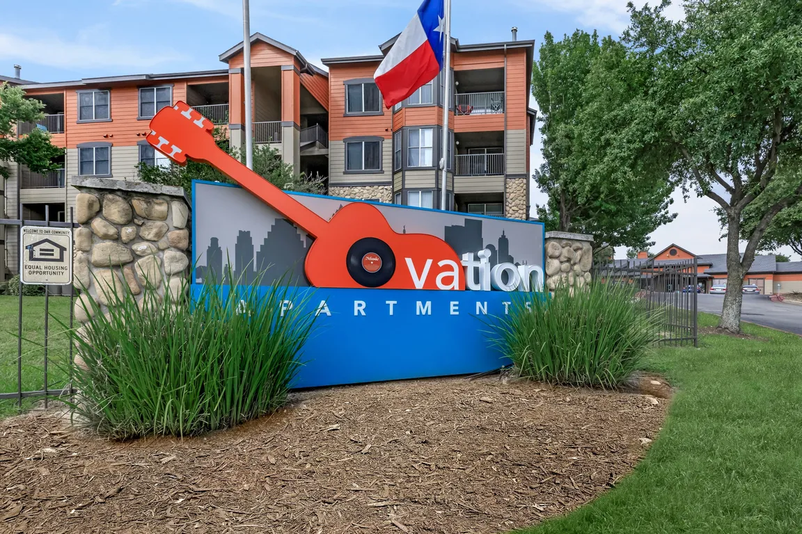 Signature Guitar Monument Sign at Ovation Apartments in Austin, TX
