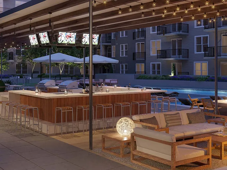 Poolside lounge area with bar and ample seating
