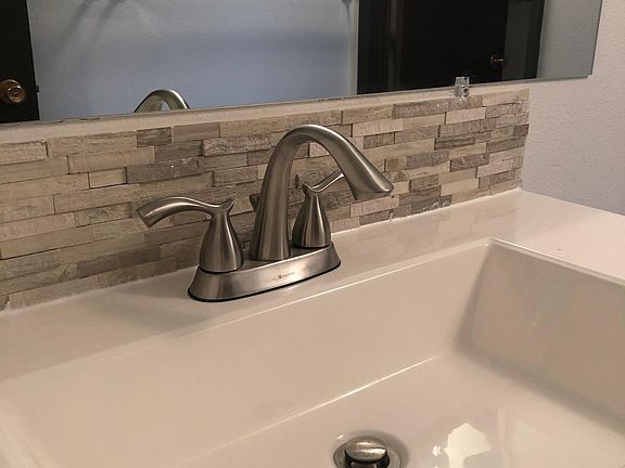 Upgraded sink, faucet and tile