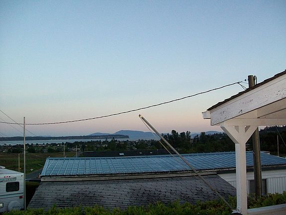 BACK POURCH LOOKING AT BAY