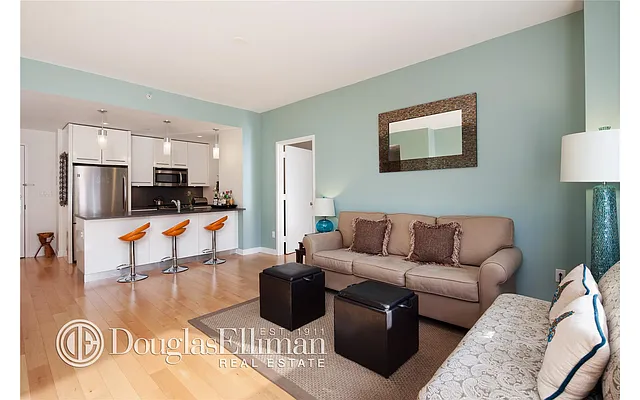 Sold by Douglas Elliman | media 13